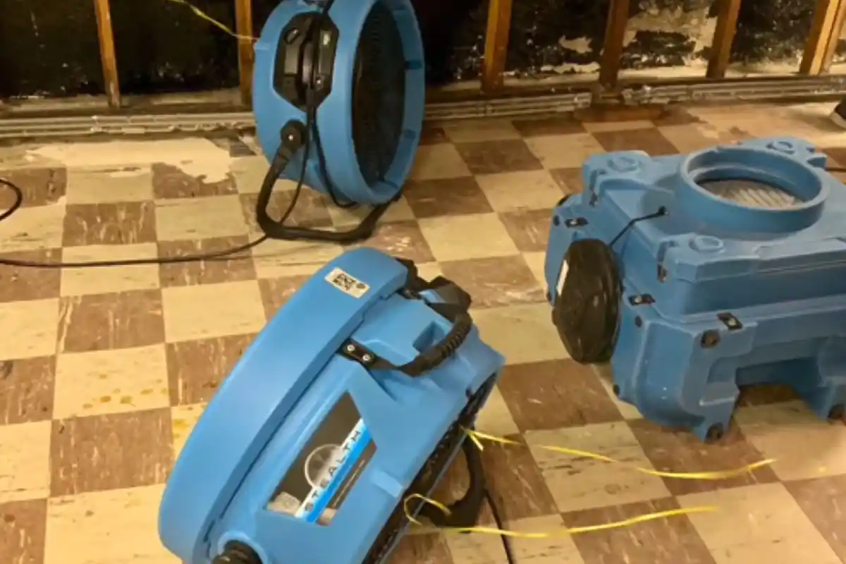 Water damage extraction equipment in a Parker, CO basement